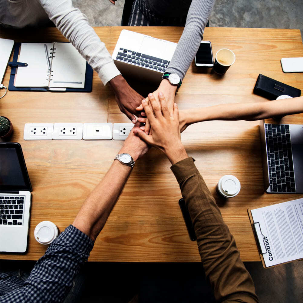 Team collaborating around a table
